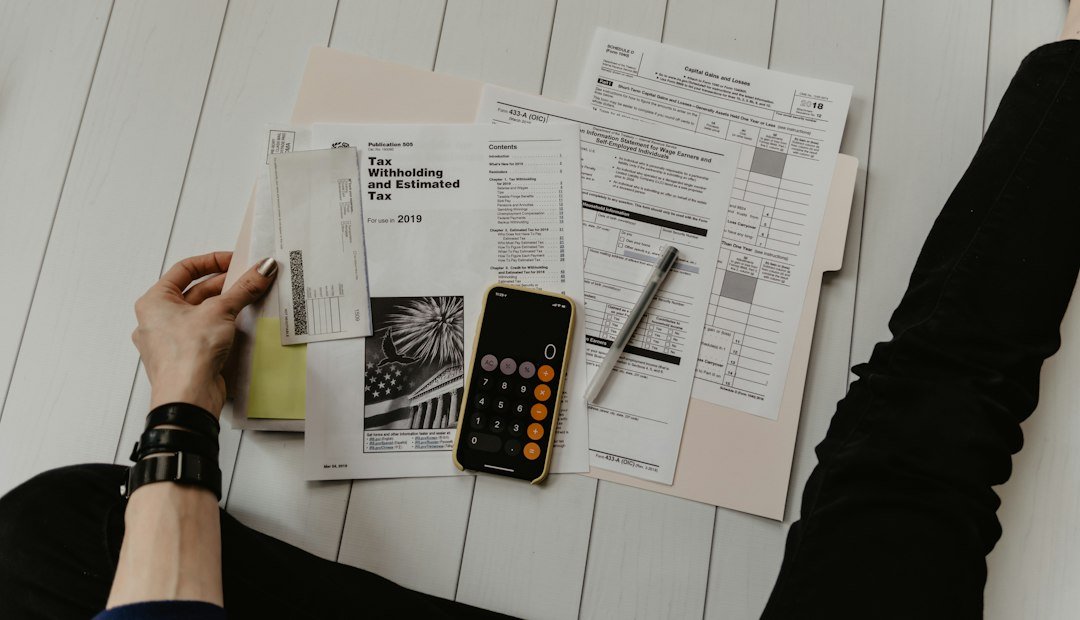 Financial documents and calculator illustrating borrower affordability and loan repayment checks