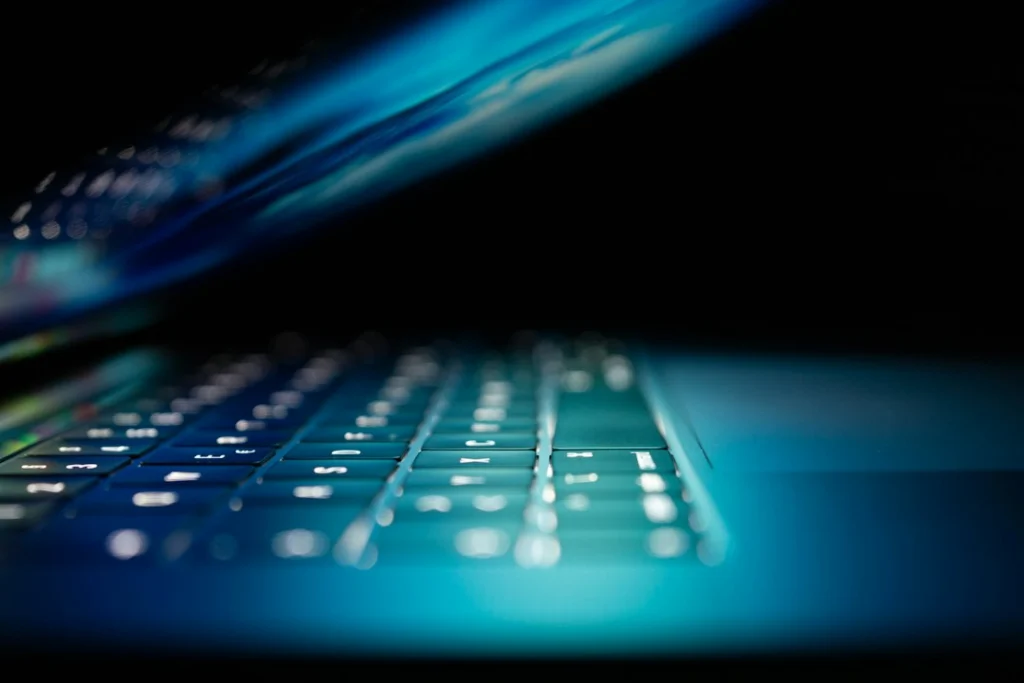 Laptop computer illustrating cybersecurity and online scam prevention; not a photograph of the Ghana operation